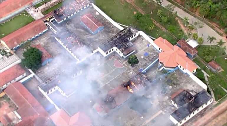 At least 60 killed in drug gang war in Brazil prison