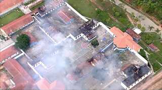 At least 60 killed in drug gang war in Brazil prison