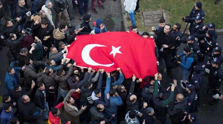 Turkish police kill two suspected attackers after car bomb in Izmir