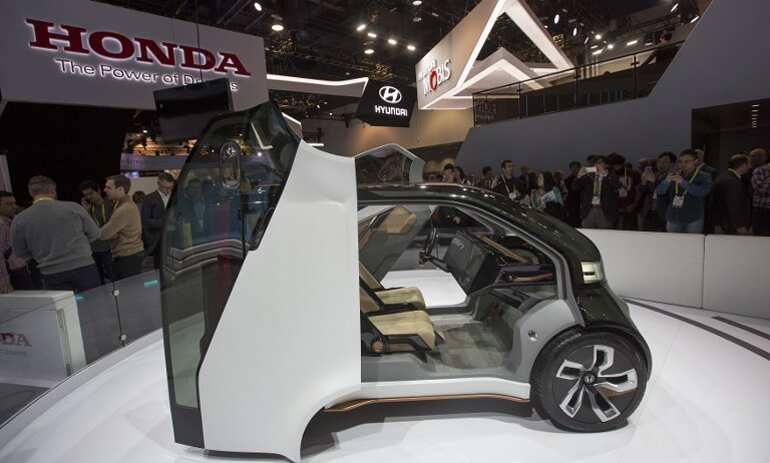 The new Honda NeuV concept vehicle is displayed during CES.