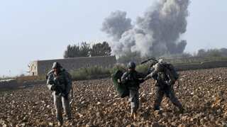 Triple blasts rock Afghanistan: More than 30 Killed in Kabul suicide bombings, 9 dead in explosion Kandahar guesthouse