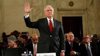 Trump's AG nominee Sessions questioned by senate committee as protesters shout, wear KKK hoods