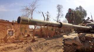 30 dead as IS attacks city in east Syria, says monitor