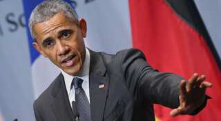 On first anniversary, Obama warns Trump not to undo Iran nuclear deal