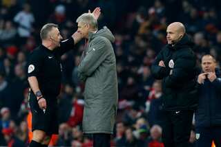 Arsenal's Wenger slapped with four-match ban for misconduct