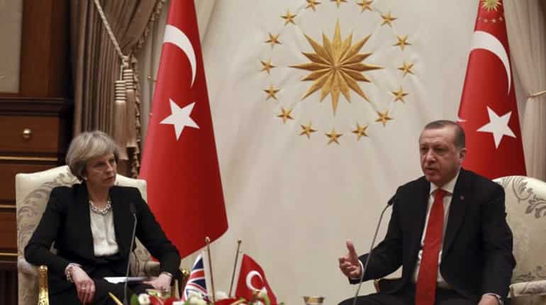 Theresa  May woos Turkey for trade, presses on human rights
