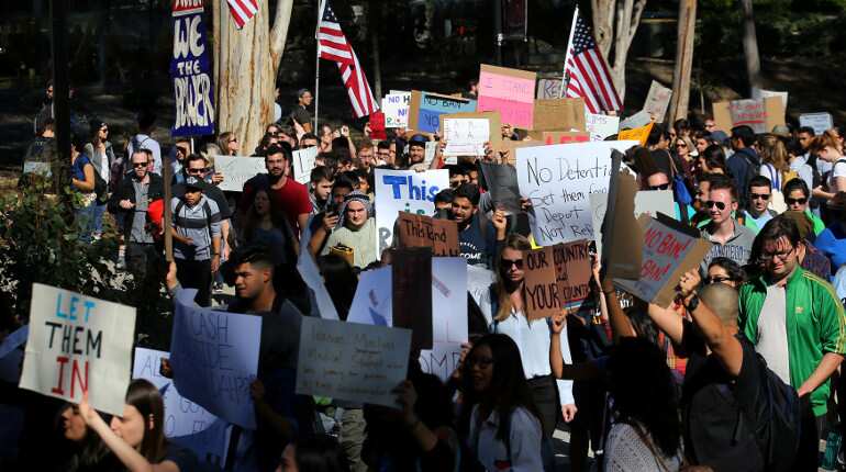 US acting attorney general defies Trump, tells Justice Department not to defend immigration ban