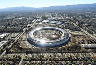 Apple's new 'spaceship' campus boasts the world's largest piece of curved glass