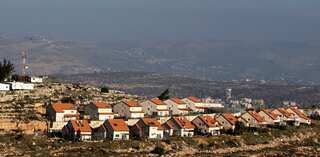 Israeli, Palestinian human rights groups to file petition against law allowing settlement