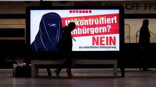 Anti-Muslim poster clouds Swiss referendum