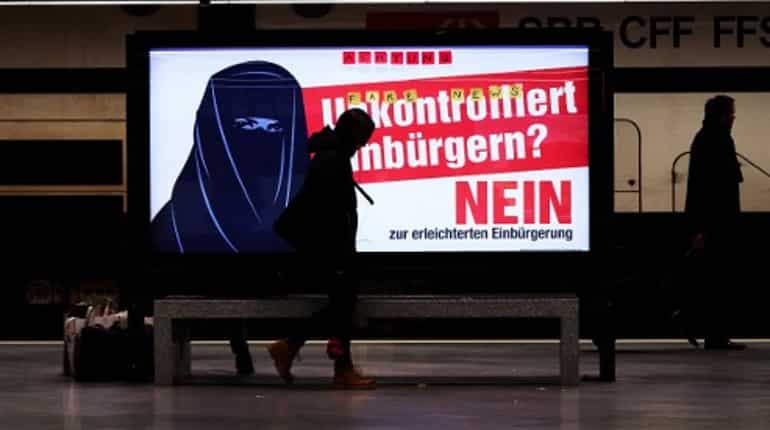 Anti-Muslim poster clouds Swiss referendum