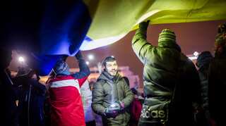 Thousands of Romanians march against government