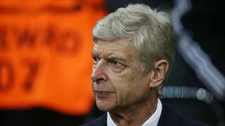 Wenger says he would prefer to remain at Arsenal
