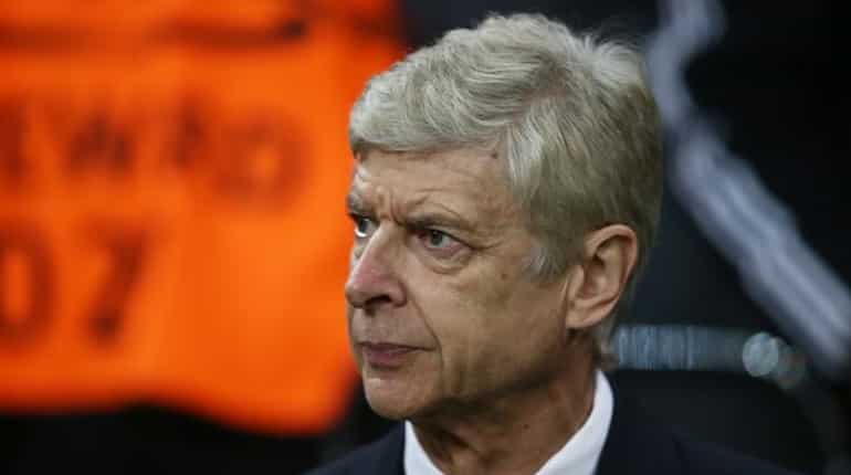 Wenger says he would prefer to remain at Arsenal