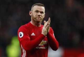 Football: Wayne Rooney says he will stay at Manchester United