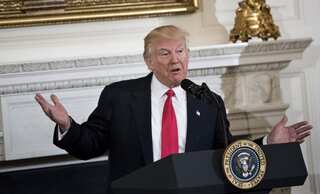 US appeals court refuses to put Trump travel ban on hold