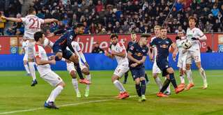 Leipzig suffer title setback after draw at Augsburg