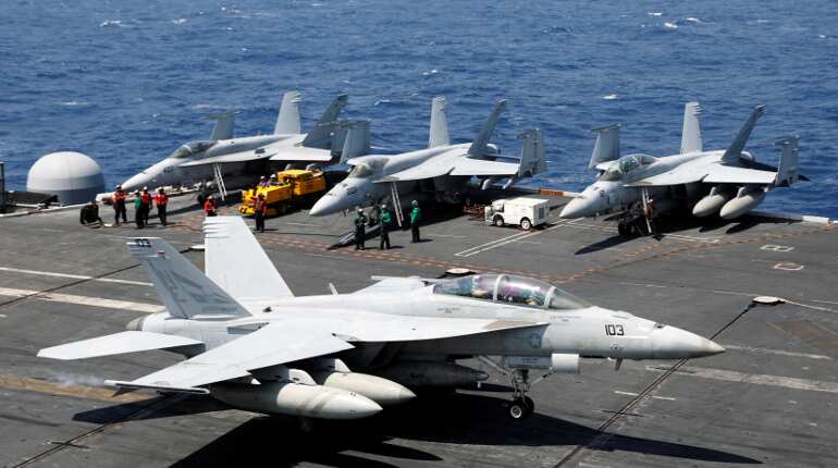 US fighter jets, helicopters fly over South China Sea