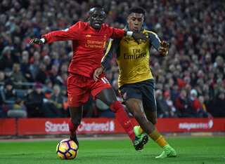 Mane-led Liverpool sparkle against lacklustre Arsenal