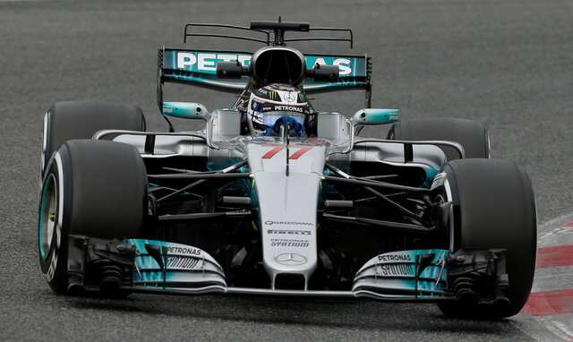 F1 testing: Bottas goes fastest as Raikkonen crashes