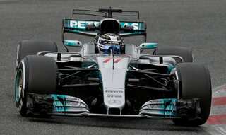 F1 testing: Bottas goes fastest as Raikkonen crashes