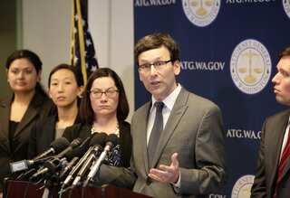 Washington, Hawaii plan to block Trump's revised travel ban