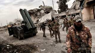 The Islamic State forces young men to fight for them in Mosul