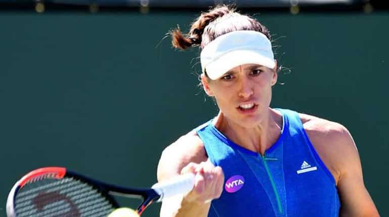 Kerber holds off Parmentier to advance at Indian Wells Kerber holds off Parmentier to advance at Indian Wells