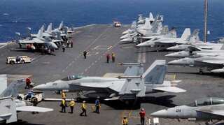 North Korea warns of 'merciless' strikes as US carrier joins South Korea drills
