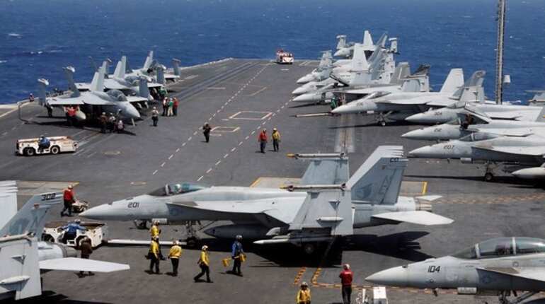 North Korea warns of 'merciless' strikes as US carrier joins South Korea drills