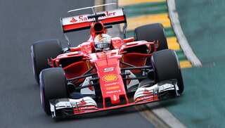 Vettel beats Hamilton to win Australian GP