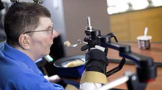 Brain implant lets paralysed man feed himself using his thoughts