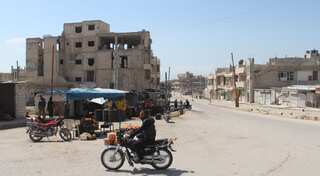 Russia 'responsible by proxy' for deaths in Syria chemical attacks: UK