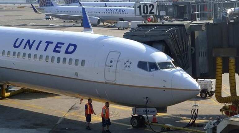 Passenger dragged from United Airlines flight in 'upsetting event' Passenger dragged from United Airlines flight in 'upsetting event'