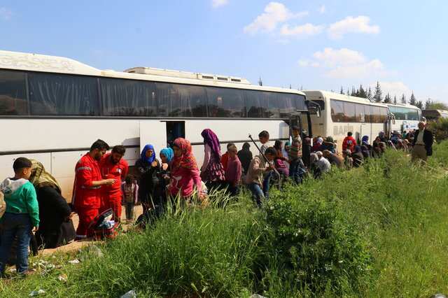 Syria: 112 evacuees killed in bomb attack on convoy Syria: 112 evacuees killed in bomb attack on convoy