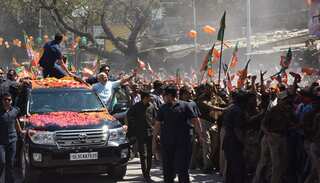 Indian PM Modi turns on charm offensive in Odisha roadshow