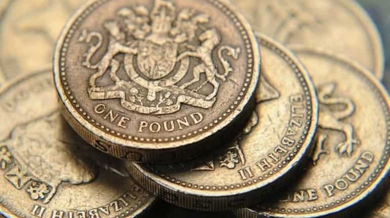 Pound holds ground after Brexit delay, most Asian markets fall