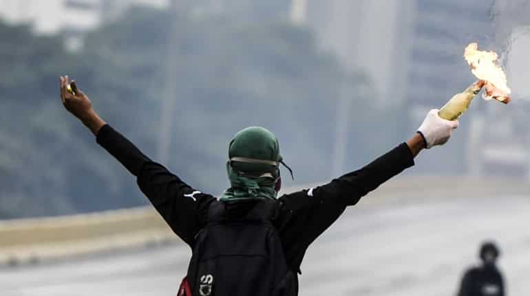 About 50 children evacuated from hospital amid unrest in Caracas About 50 children evacuated from hospital amid unrest in Caracas
