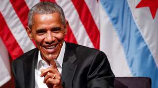 Obama makes first post-presidency appearance, no mention of Trump
