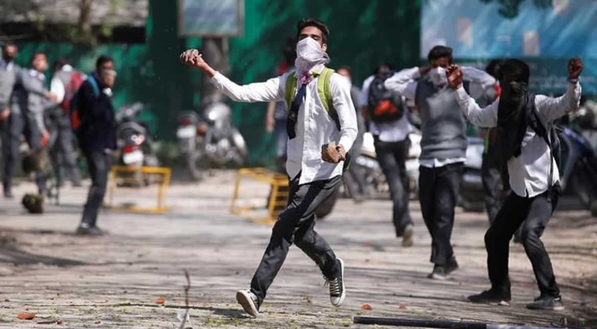 Kashmir: Militant returns home after mother asks him to