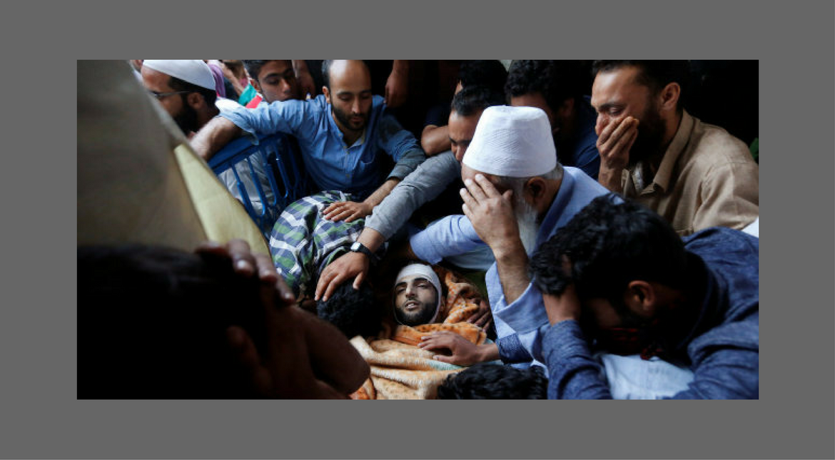 Family members mourn the death of Burhan Wani, a separatist militant leader in south Srinagar on July 9, 2016.