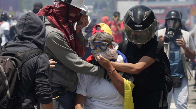 Venezuela: Death toll rises to at least 37 in month-long protests against President Maduro