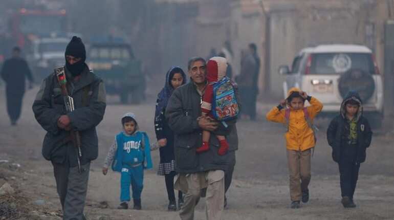 Afghan families flee as Taliban capture key northern district of Kunduz