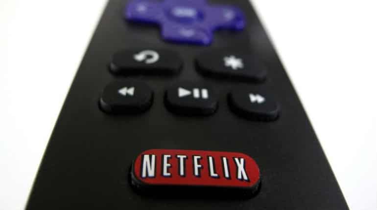 Netflix, Tesla listed as potential takeover targets for Apple