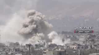 More than 1,500 rebels, families evacuate devastated Damascus district