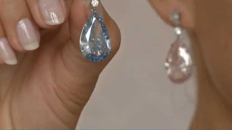 Diamond earrings fetch $57 million at Sotheby?s auction Diamond earrings fetch $57 million at Sotheby?s auction