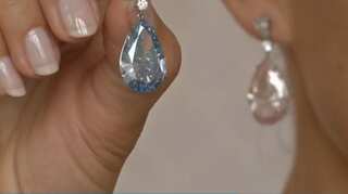 Diamond earrings fetch $57 million at Sotheby?s auction