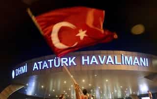 Erdogan's Turkey targets opposition newspaper staffers over suspected coup links