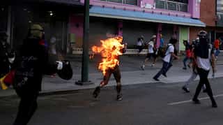 Fresh Venezuela clashes after man set alight