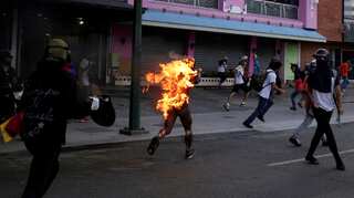Fresh Venezuela clashes after man set alight